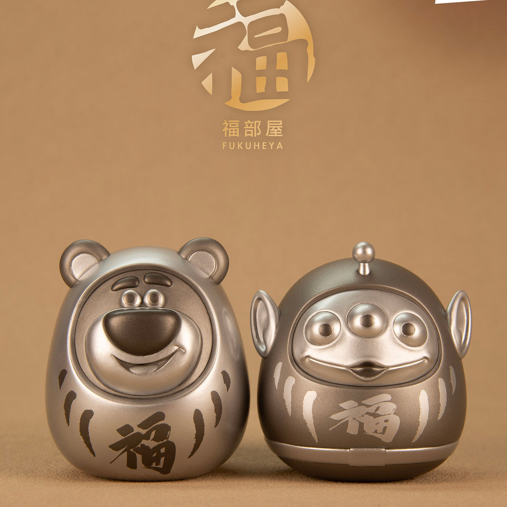 
                  
                    URDU / Disney Fukuheya Lucky Blind Box Series 7 - Daruma Lotso & Alien
                  
                